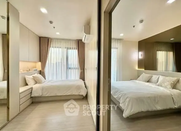 Modern dual-bedroom setup with elegant decor and ample natural light