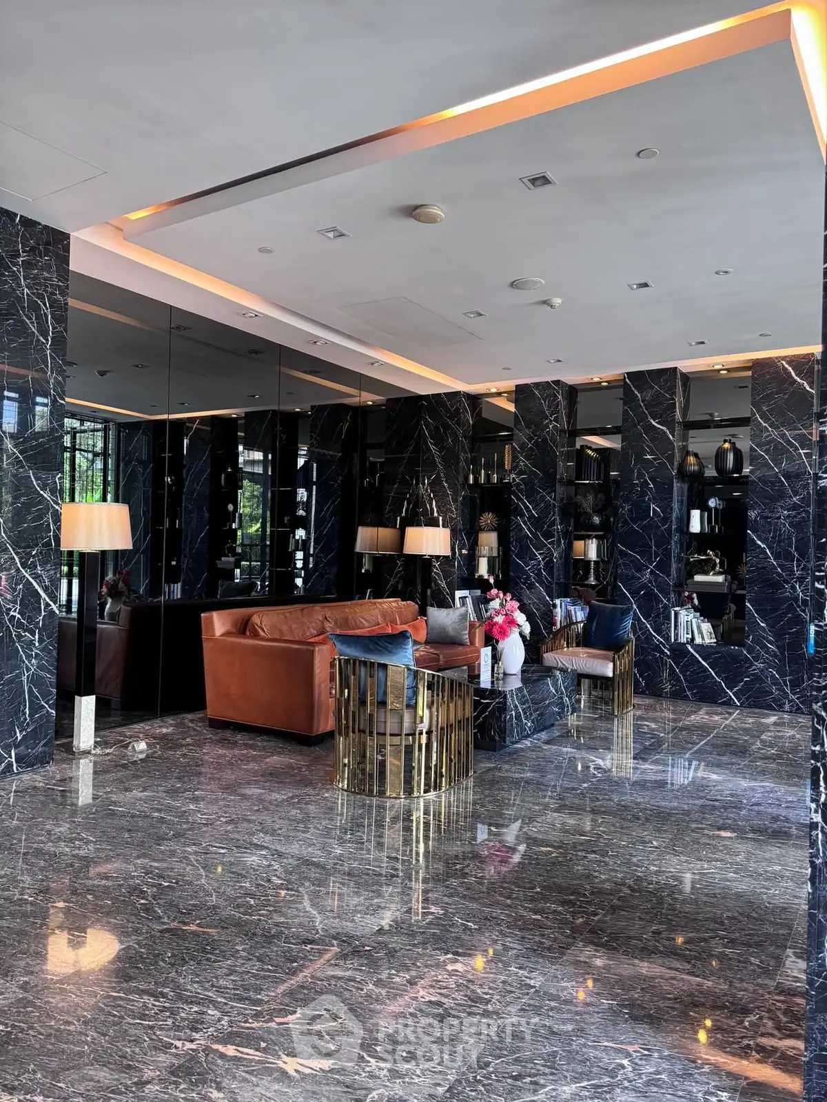 Luxurious living room with marble floors and elegant decor