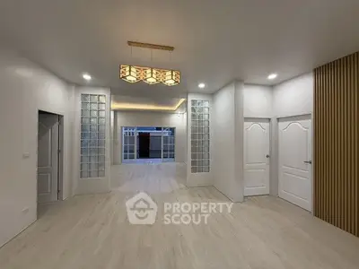 Spacious modern interior with elegant lighting and sleek design
