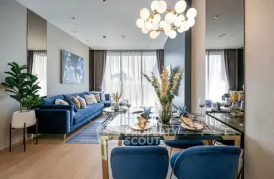 Luxurious modern living room with elegant dining area and stylish decor