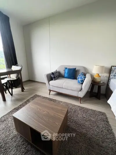 Modern living room with cozy sofa and stylish decor