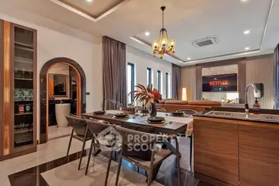 Luxurious open-plan living room with modern kitchen and elegant dining area