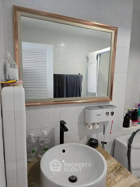 Modern bathroom with elegant mirror and stylish sink