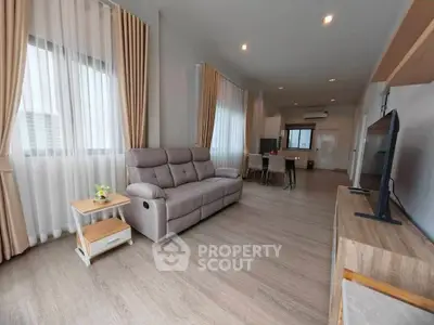 Spacious modern living room with elegant decor and natural light