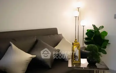 Stylish modern living room with elegant decor and cozy lighting.