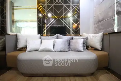 Luxurious modern living room with stylish sofa and decorative pillows