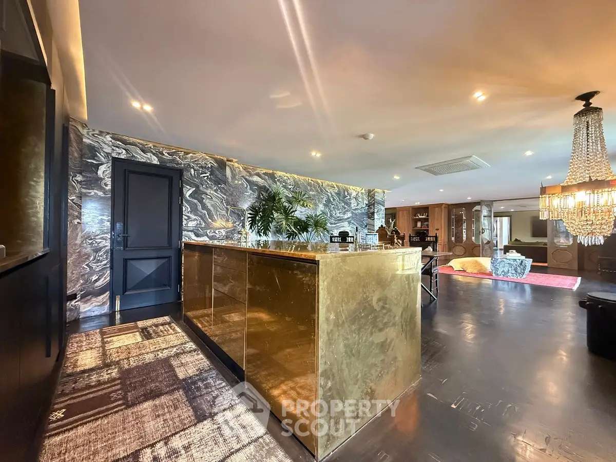 Luxurious living room with elegant decor and stunning chandelier