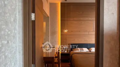 Luxurious bedroom with modern wooden paneling and ambient lighting