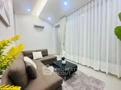 Modern living room with stylish sofa and elegant decor