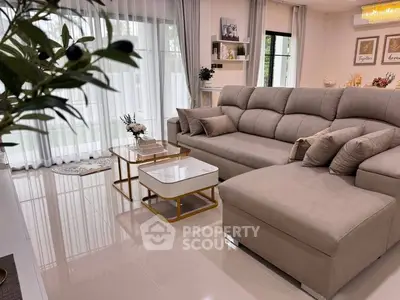 Luxurious modern living room with plush sectional sofa and elegant decor