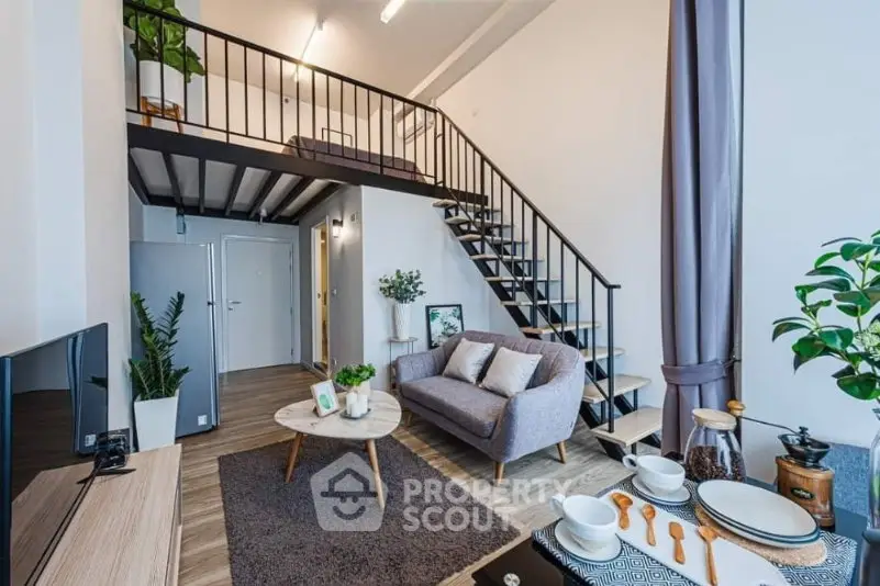 Modern loft-style living room with mezzanine, stylish decor, and open layout.