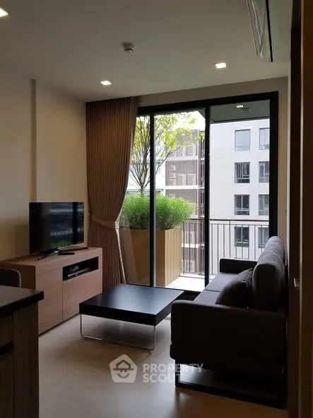 Modern living room with balcony view in stylish apartment