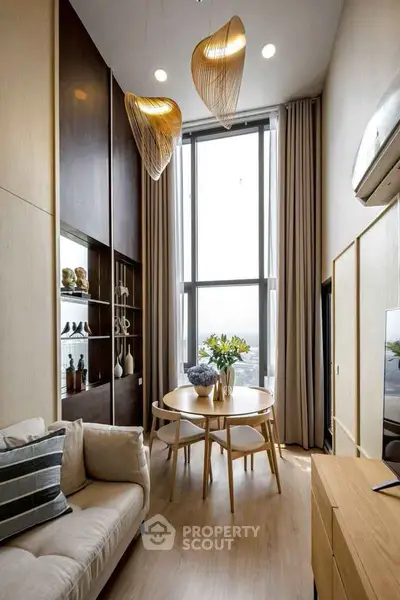 Stylish modern living room with high ceilings and elegant decor