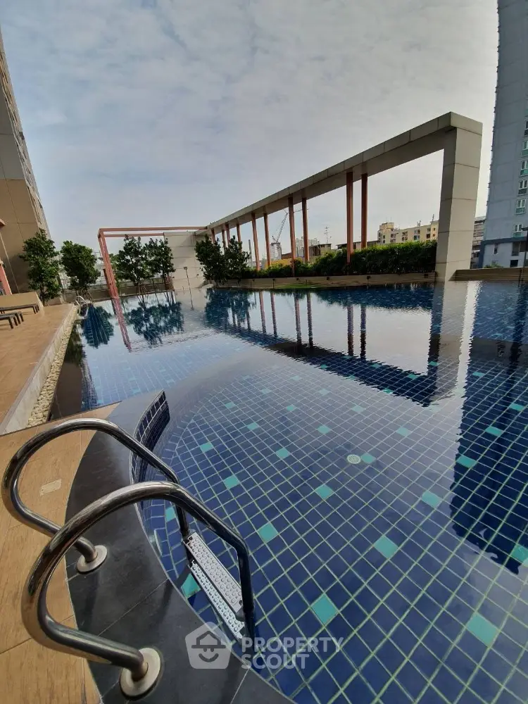 Luxurious rooftop pool with stunning city views and modern design elements.