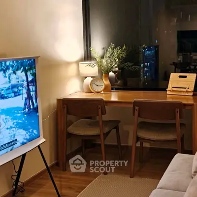 Cozy living room with stylish wooden furniture and ambient lighting, perfect for relaxation and entertainment.