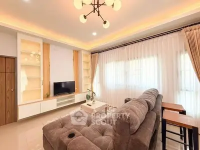 Stylish modern living room with cozy sofa and elegant lighting