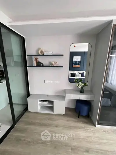 Modern minimalist bedroom with sleek decor and stylish shelving