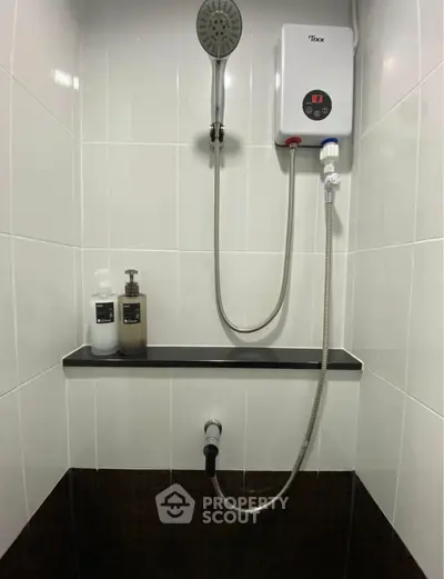 Modern bathroom shower with sleek design and water heater