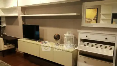 Modern living room with sleek TV unit and stylish decor