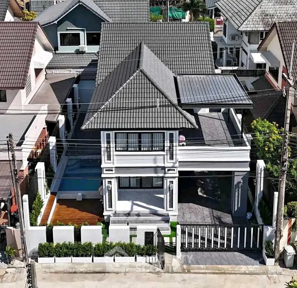 Stunning modern house with sleek design and spacious layout in a desirable neighborhood.