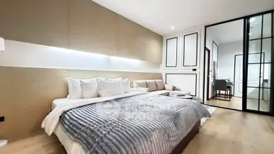 Luxurious modern bedroom with elegant decor and cozy ambiance