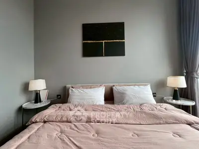 Modern bedroom with stylish decor and cozy bedding