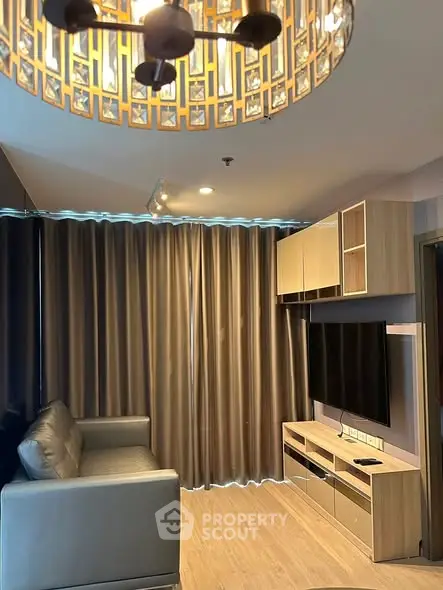 Modern living room with stylish lighting and sleek furniture