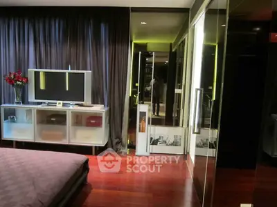 Luxurious bedroom with modern decor and sleek furnishings