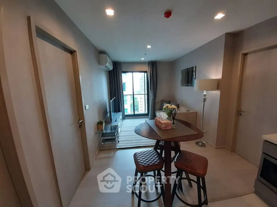 Modern living room with stylish furniture and natural light, perfect for urban living.