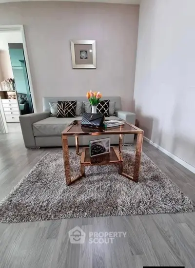 Stylish living room with modern decor and elegant furniture, perfect for cozy gatherings.