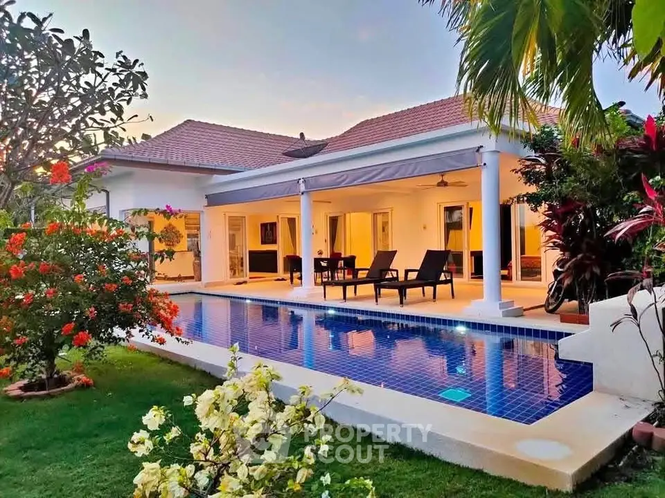 Stunning villa with private pool and lush garden, perfect for luxury living.