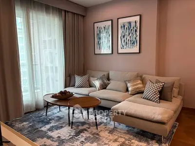 Stylish modern living room with chic decor and cozy seating area.