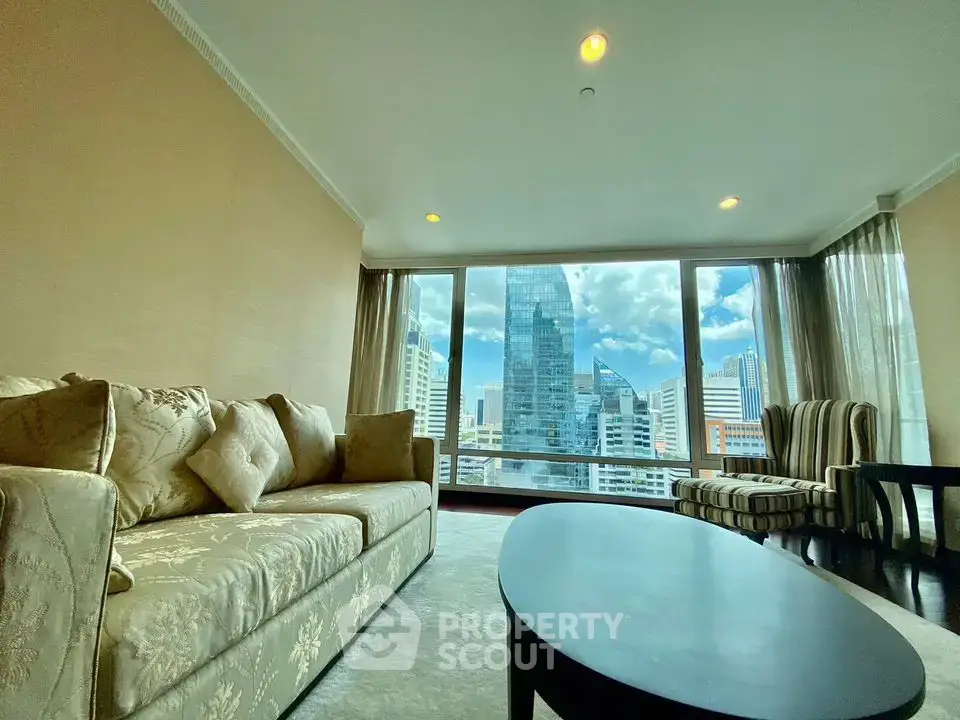 Spacious living room with stunning city view and elegant furnishings