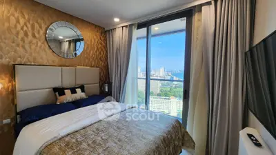 Luxurious bedroom with stunning city view and elegant decor