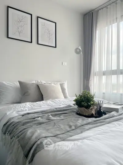 Cozy bedroom with modern decor and natural light