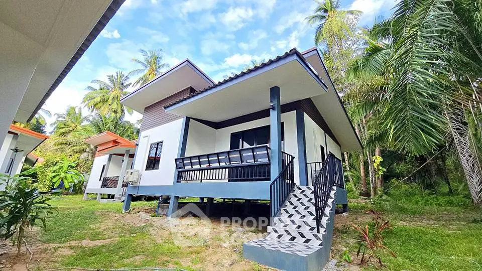 Charming tropical bungalow with modern design and lush surroundings