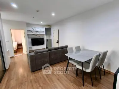 Modern living room with sleek furniture and open layout, perfect for contemporary living.