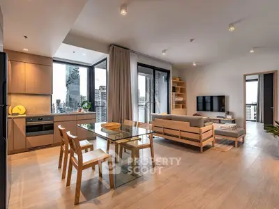 Modern open-plan living room with city view, featuring sleek furniture and contemporary design.