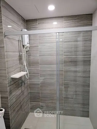 Modern bathroom with sleek shower design and elegant tile work