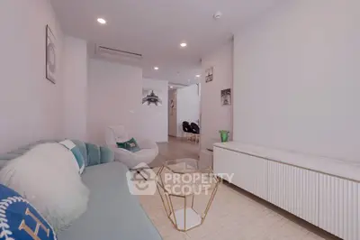 Modern living room with stylish furniture and elegant decor