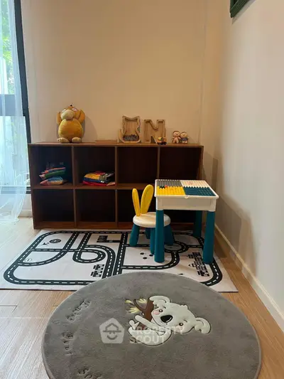 Charming kids' playroom with cozy decor and playful furniture, perfect for family living spaces.