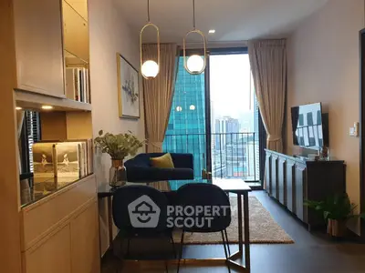 Modern living room with city view, elegant decor, and cozy seating area.