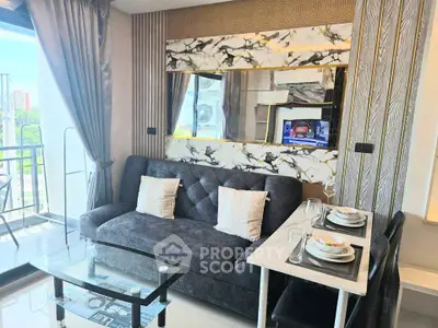Modern living room with elegant decor and dining area in a stylish apartment.