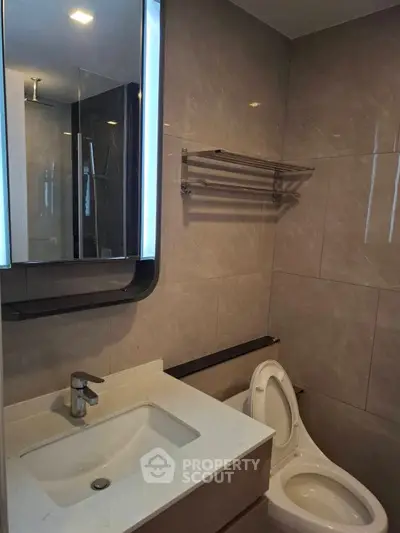 Modern bathroom with sleek fixtures and elegant tile design