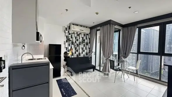 Modern open-plan living room with city view and stylish decor