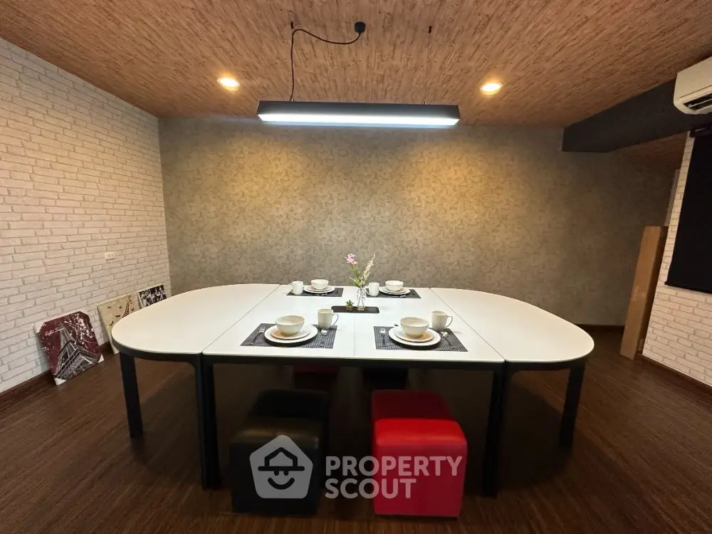 Modern dining area with stylish table and ambient lighting