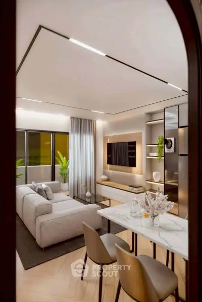 Modern living room with sleek furniture and ambient lighting, featuring a stylish open layout.