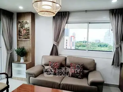 Stylish living room with modern decor and city view window