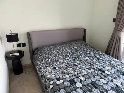 Cozy bedroom with modern decor and natural light