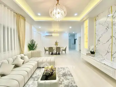 Luxurious living room with elegant chandelier and modern decor